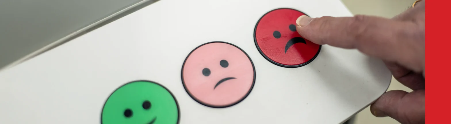 Customer pressing red button with sad emoticon for negative feedback closeup Stock Photo, ft. airport & assessment - Envato