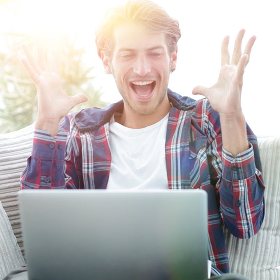 Happy person at computer